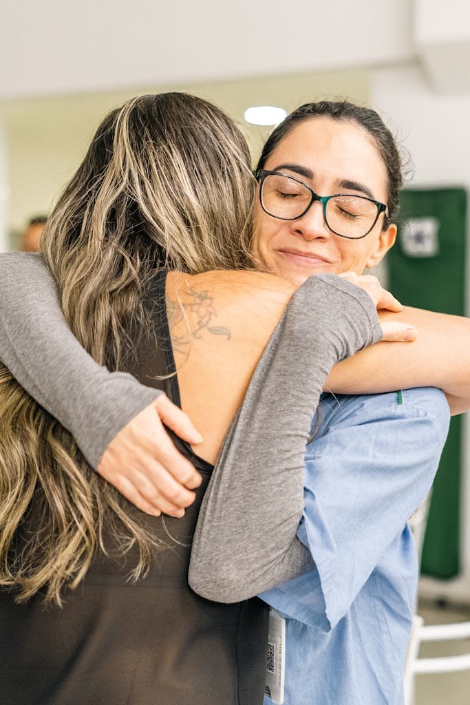 Two Young Women Embracing